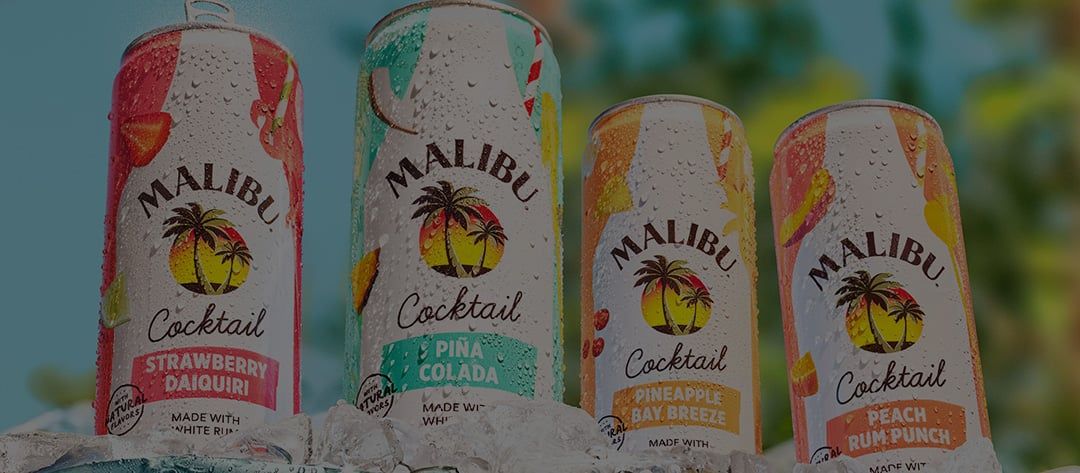 Malibu can cocktails - Strawberry daiquiri, Pina Colada, Pineapple bay breeze, peach rum punch - standing on an icy edge