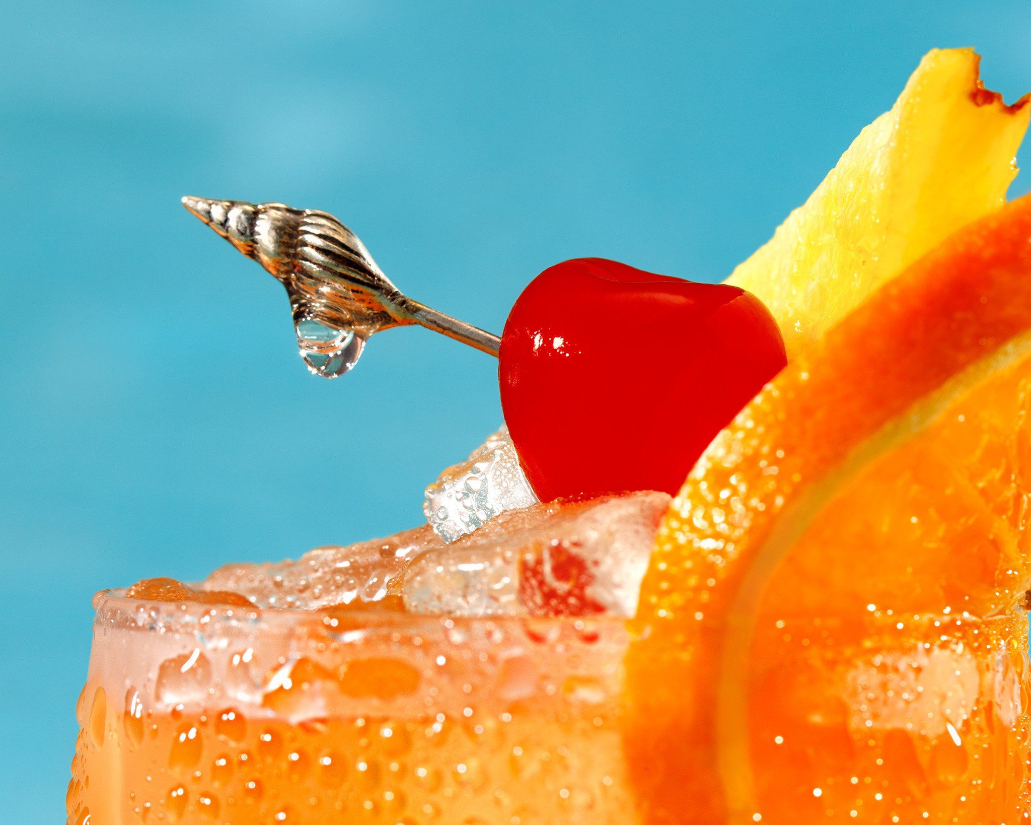 Close up of cherry garnish on cocktail