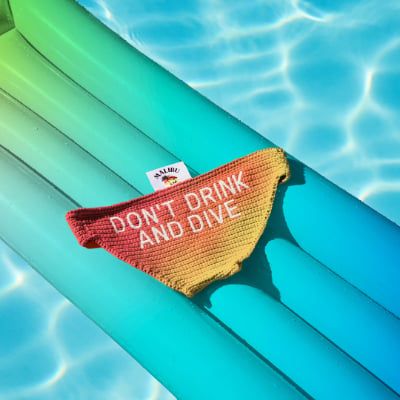 Knitted Bucket hat with Don't drink and dive message