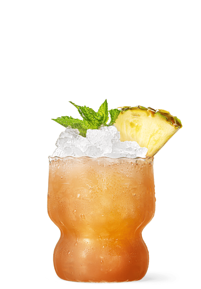 Malibu Black Bahama Mama garnished with a pineapple wedge and mint sprig in front of a transparent background