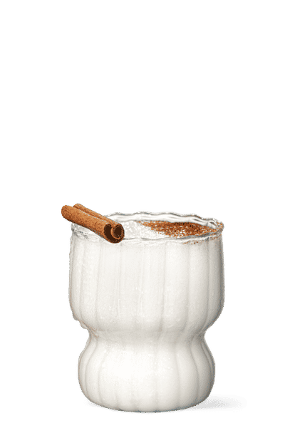 One Malibu Coquito in a hurricane glass in front of a transparent background