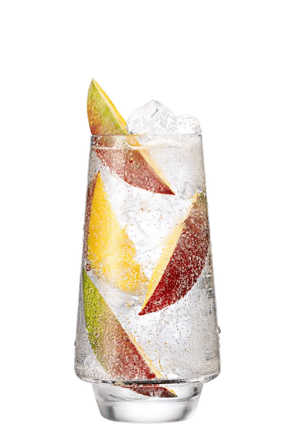 Malibu Mango & Soda Water cocktail in a tall glass with clear sparkling drink, ice cubes, mango slices, and red and green apple wedges, isolated on a white background.