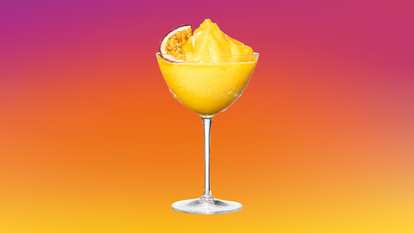 Malibu Passion Fruit Frozen Daiquiri served blended with ice and passion fruit for a smooth, tropical frozen cocktail.