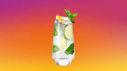 Malibu Passion Fruit Mojito served over ice with lime, mint, and passion fruit for a fresh, tropical twist on the classic cocktail.