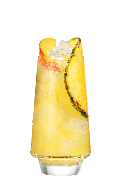 Malibu Peach & Pineapple Juice cocktail in a tall glass with yellow drink, ice cubes, peach slices, and pineapple wedge garnish, condensation on the glass, isolated on a white background.
