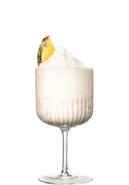 Malibu Piña Colada Slushy cocktail in a textured goblet glass with frozen white blend and a pineapple wedge garnish, smooth creamy surface and frosted glass, isolated on a white background.