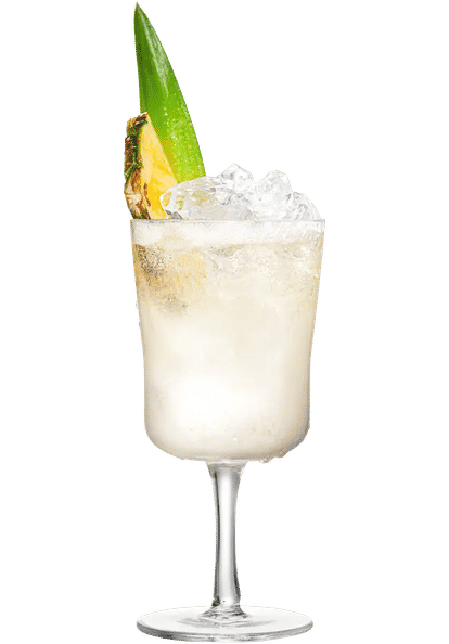 Malibu Sparkling Piña Colada cocktail in a stemmed glass with light creamy drink, ice cubes, and pineapple wedge garnish, isolated on a white background.