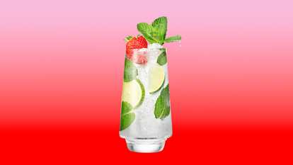 Malibu Strawberry Mojito served over ice with lime, mint, and strawberry for a fresh, fruity tropical twist on the classic cocktail.