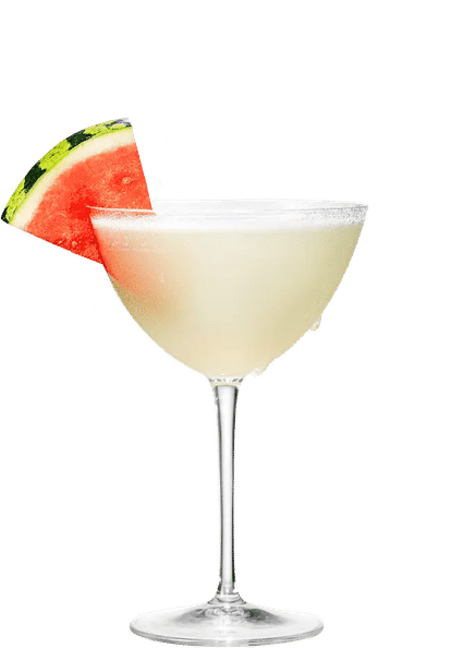 Malibu Watermelon Daiquiri cocktail in a coupe glass with pale creamy drink, frothy rim, and triangular watermelon slice garnish, condensation on the glass, isolated on a white background.