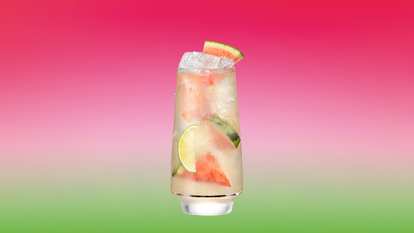 Malibu Watermelon Lemonade served over ice with watermelon chunks and lime slices for a bright, juicy tropical refresher.