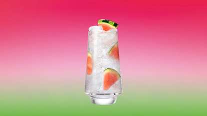 Malibu Watermelon & Soda Water served over ice with juicy watermelon pieces for a crisp, sparkling tropical refresher.