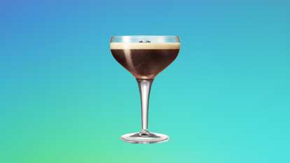 Malibu Coco Cold Brew served in a coupe glass with a creamy foam top and coffee bean garnish, set against a turquoise‑to‑green gradient background for a smooth, tropical vibe.
