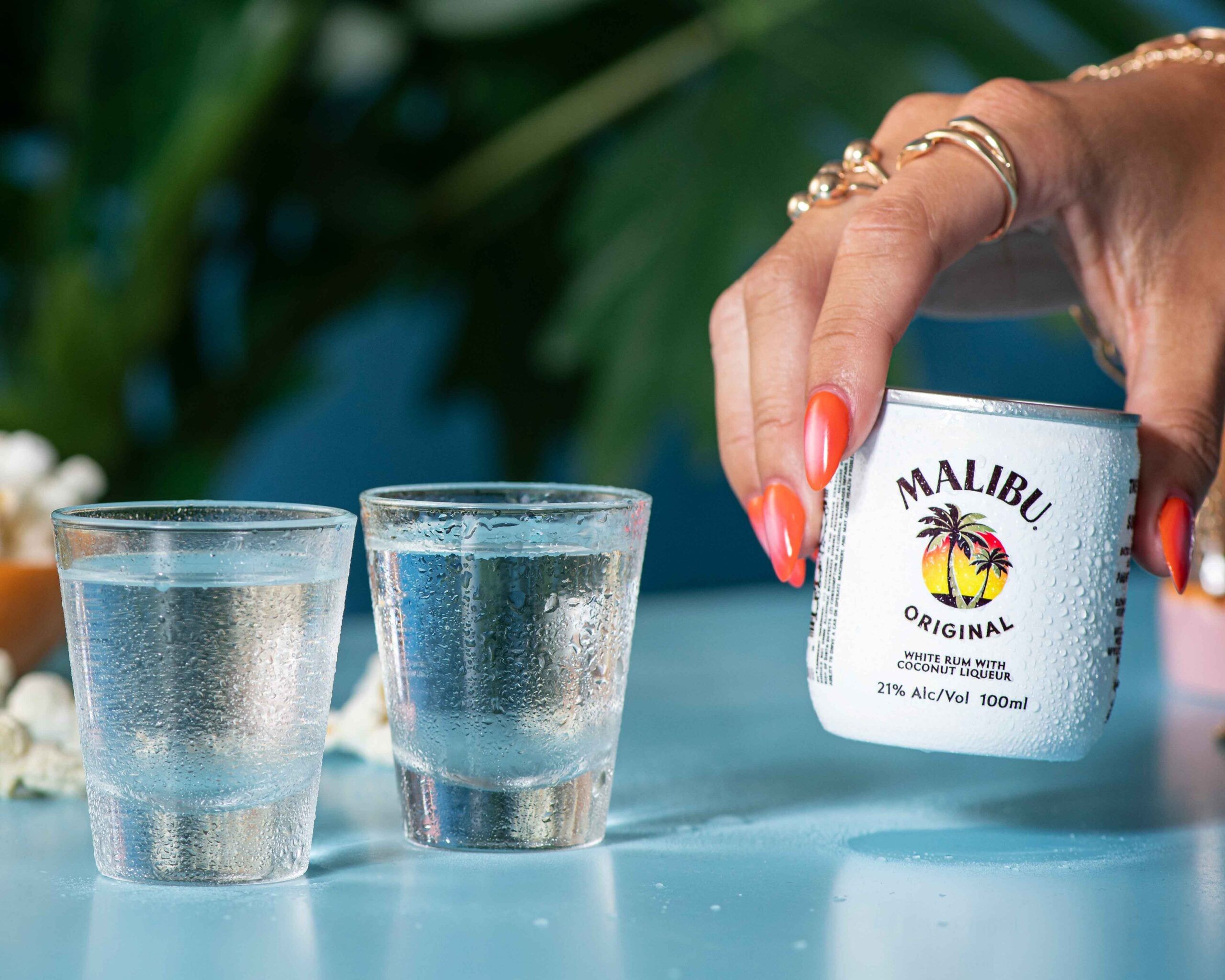 Malibu Original Can and Shots Hand