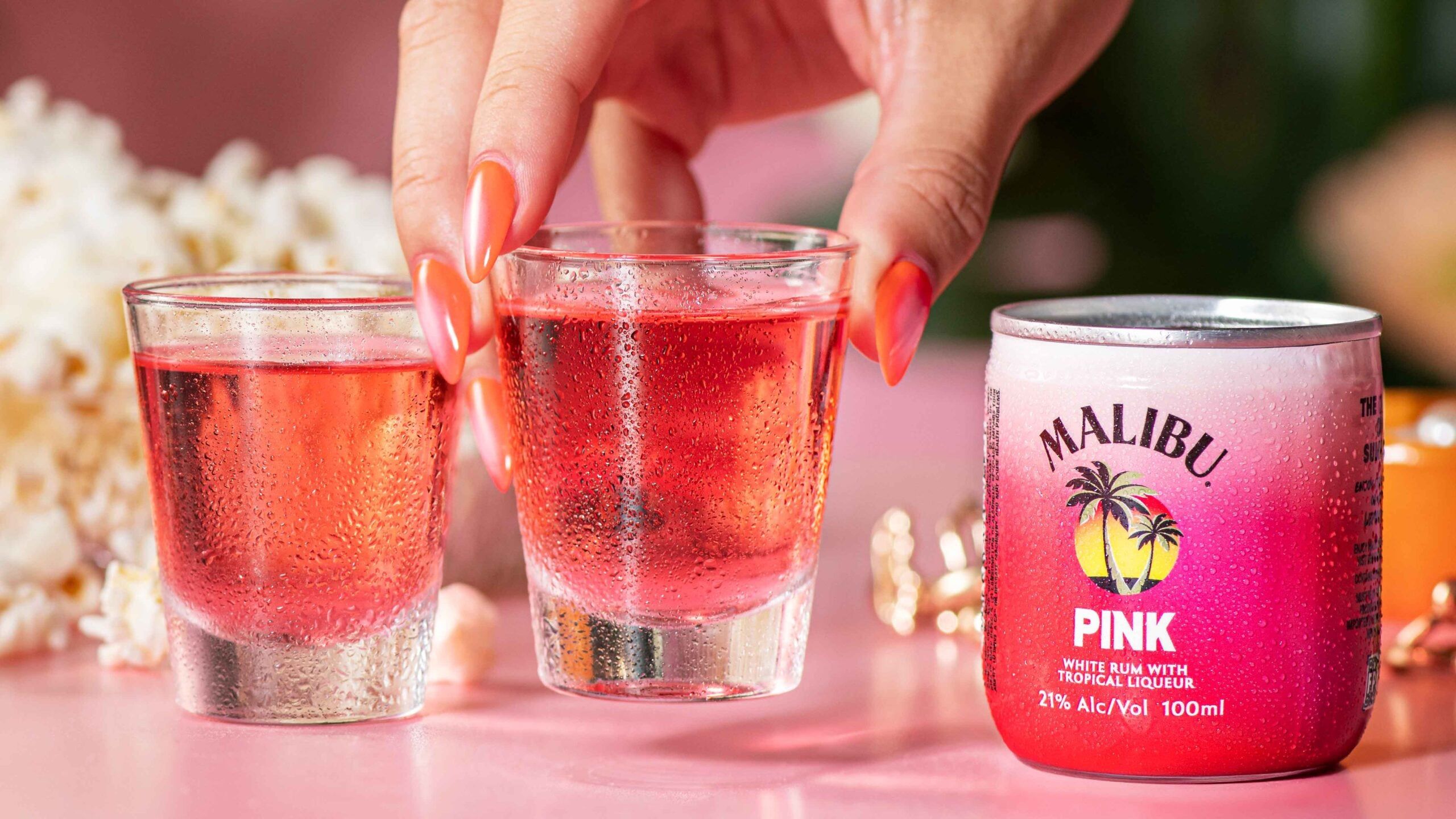 Malibu Pink Can and Shots Hand