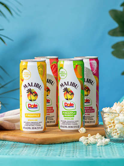 Malibu dole cans on table